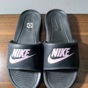 Nike Men's Slides. Size 7. Slightly Used. Great Condition. Black/Champagne Color